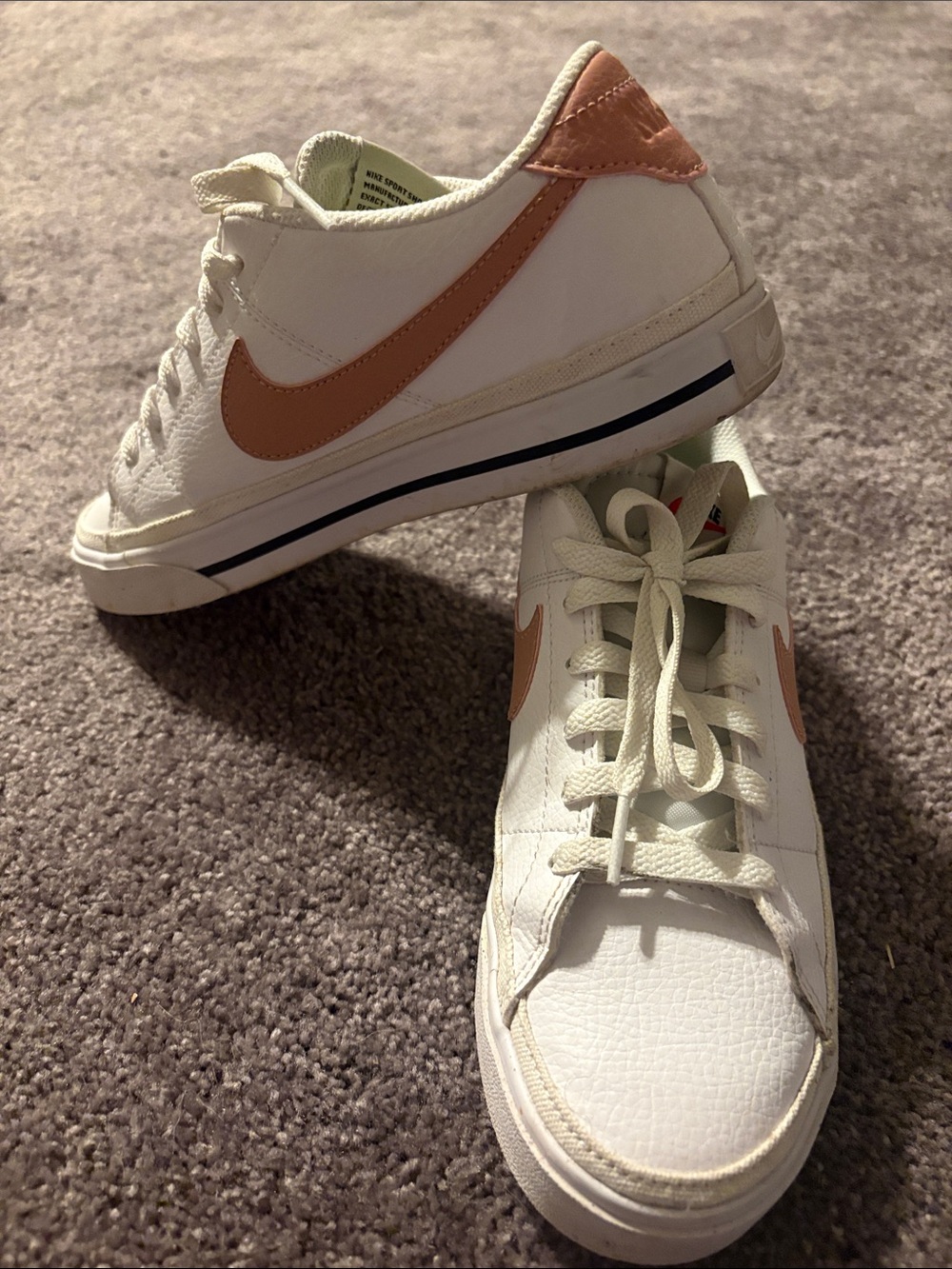Nike Low-Top White Sneakers with Tan Swoosh